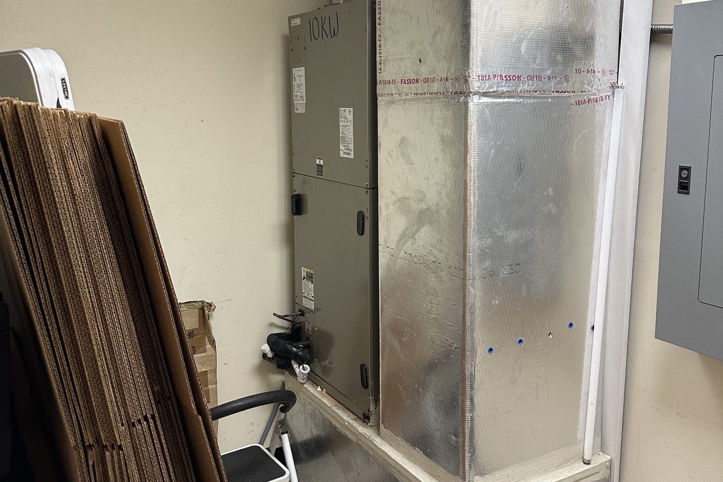 An air handler in a metal-framed utility closet in Hernando County, FL.
