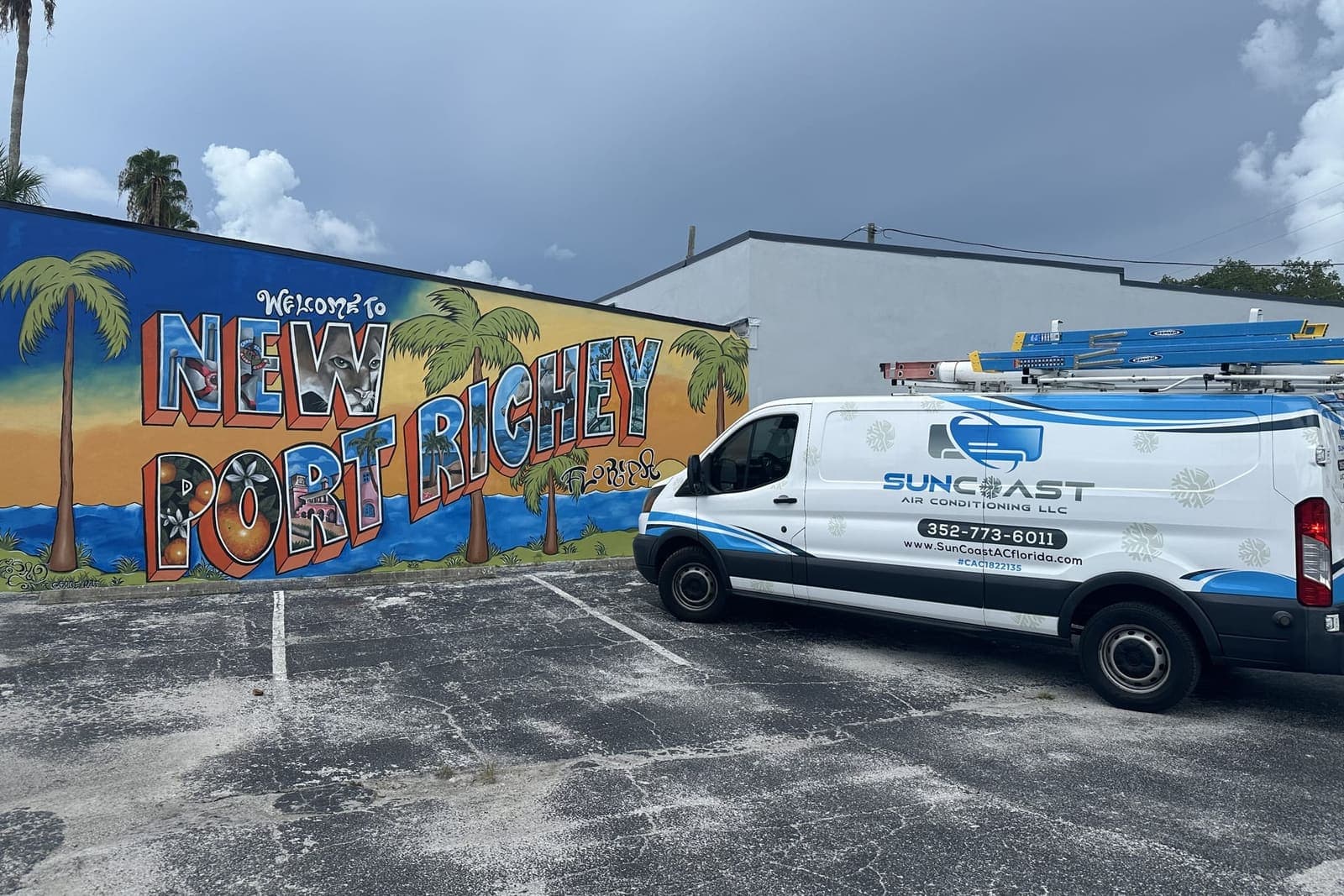 The SunCoast van parked in front of the New Port Richey mural in New Port Richey, FL.