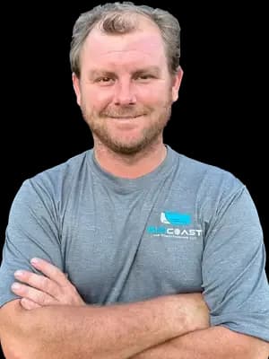 Anthony, AC technician at SunCoast Air Conditioning LLC, in a SunCoast uniform shirt