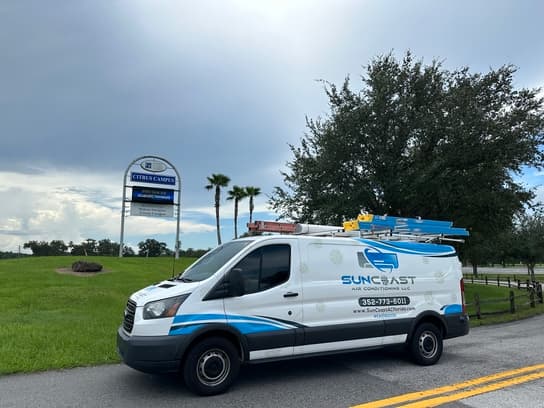 SunCoast Air Conditioning van by the Citrus Campus sign in Lecanto, Florida