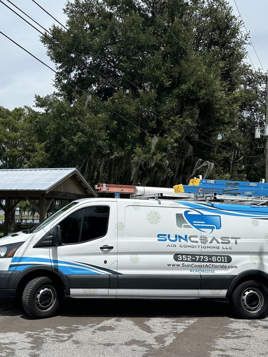 The SunCoast van parked beside the Hernando Beach and Community Park sign.