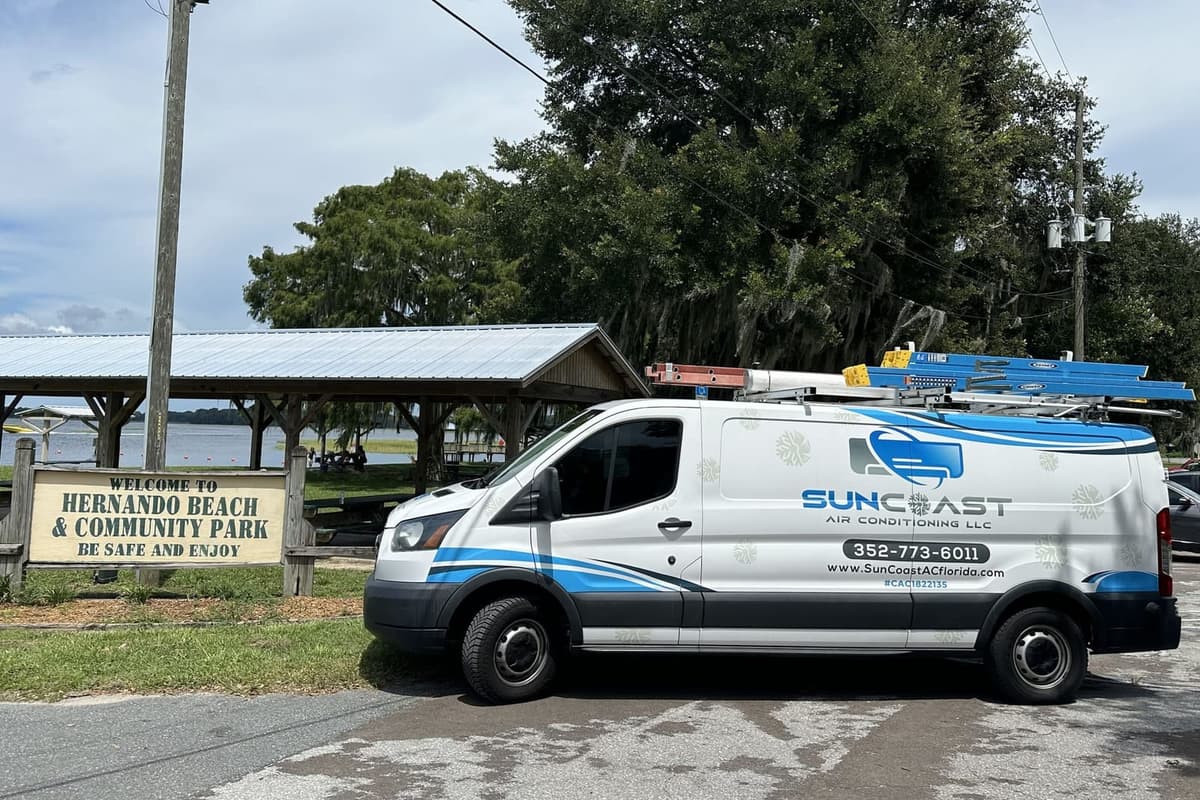 The SunCoast van parked beside the Hernando Beach and Community Park sign.