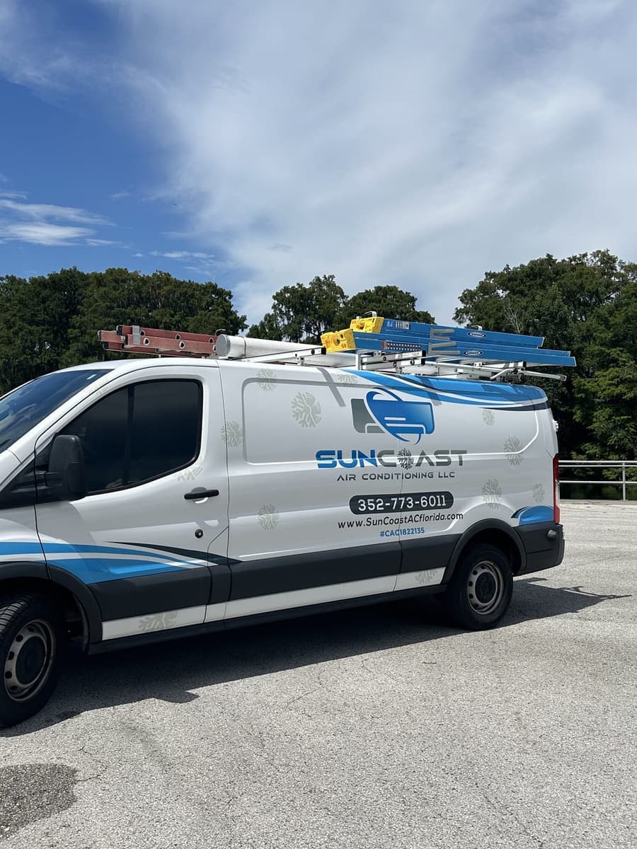 The SunCoast van parked by a lake path in Citrus County, FL.