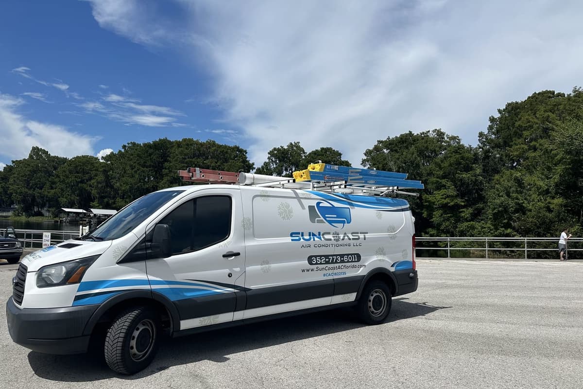 The SunCoast van parked by a lake path in Citrus County, FL.
