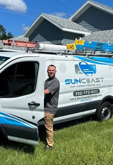 SunCoast Air Conditioning technician finishing an air conditioning service call in Spring Hill, Florida