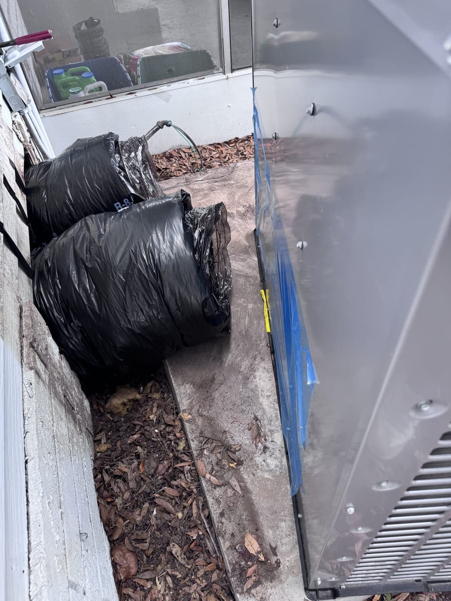 Black-wrapped flexible duct bundled for an installation in Hernando County, FL.