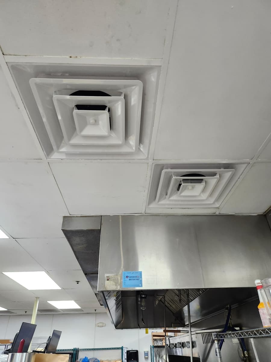 A dusty ceiling supply diffuser.
