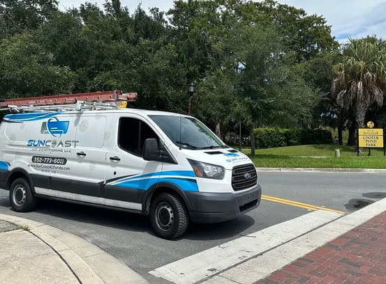 SunCoast Air Conditioning van parked near Cooter Pond Park in Inverness, Florida