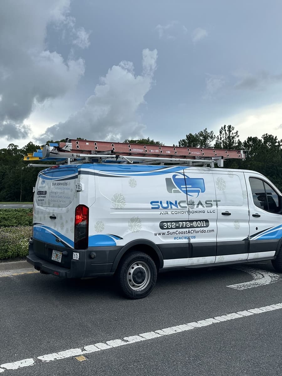 The SunCoast van parked beside the Connerton community sign in Land O' Lakes, FL.