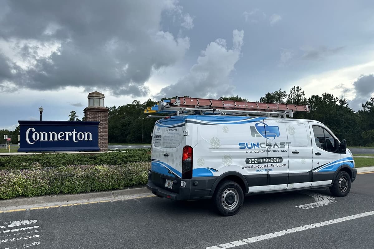 The SunCoast van parked beside the Connerton community sign in Land O' Lakes, FL.