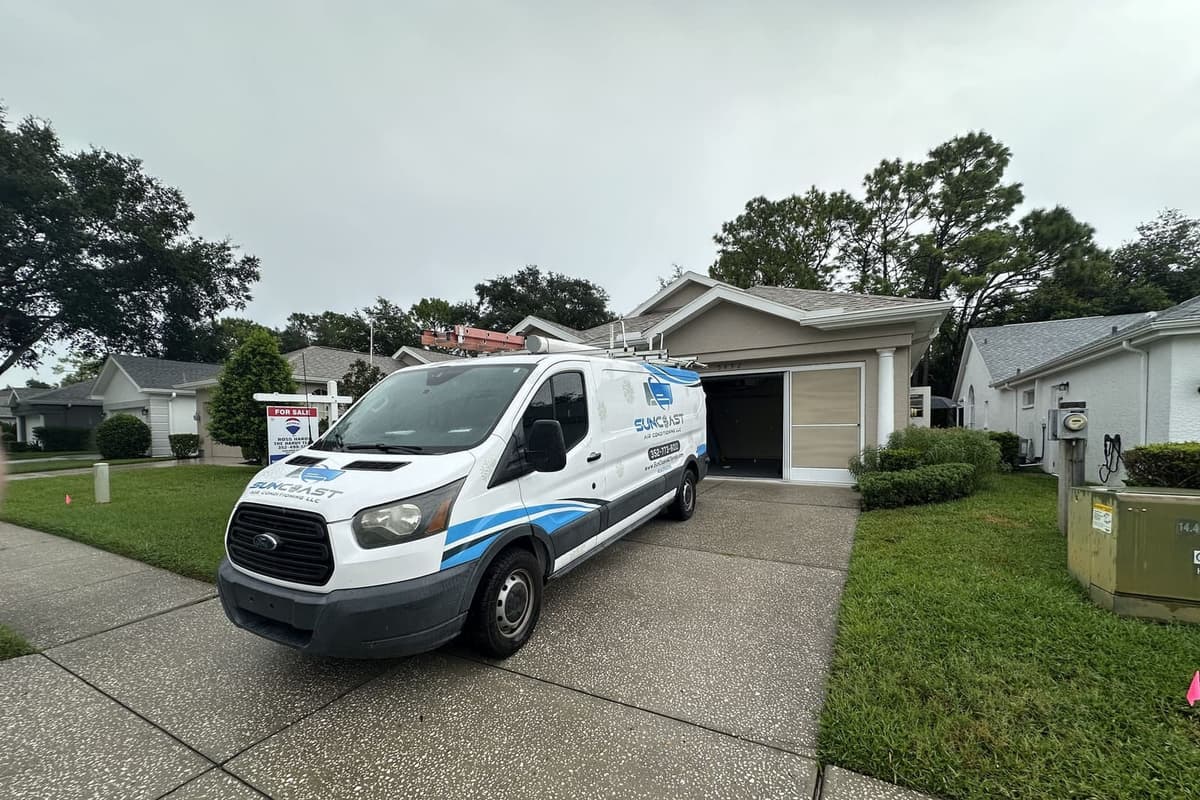 The SunCoast van parked in a driveway outside a garage in Hernando County, FL.