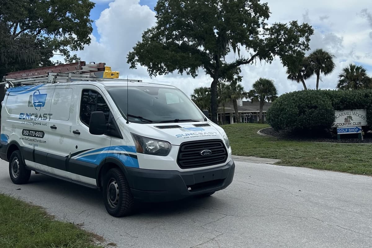 The SunCoast van parked under oak trees in Citrus County, FL.