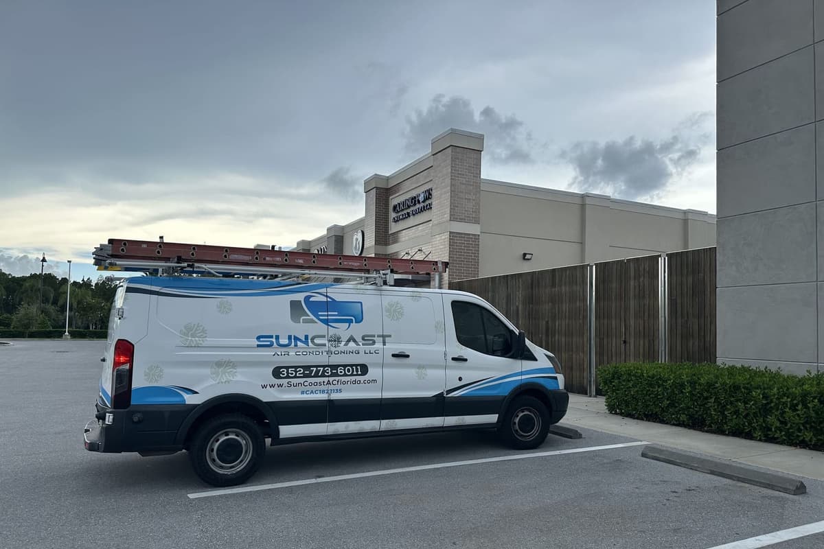 The SunCoast van parked outside a shopping plaza in Odessa, FL.