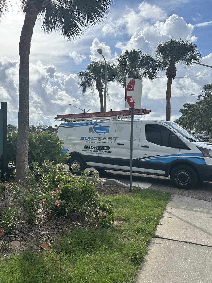 The SunCoast van parked beside the Robert J. Strickland Memorial Park sign in Hudson, FL.